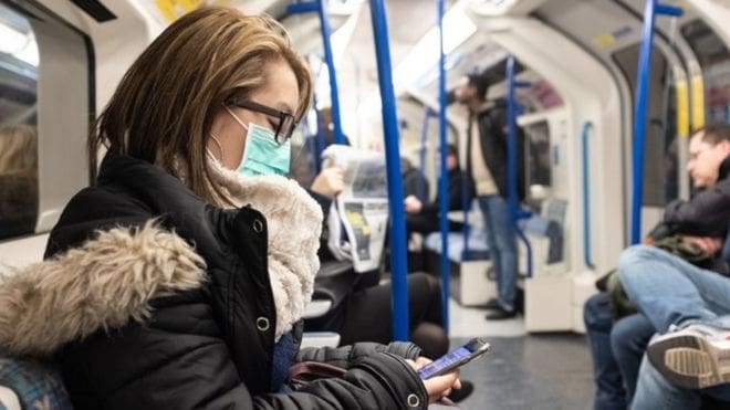 mask on tube train