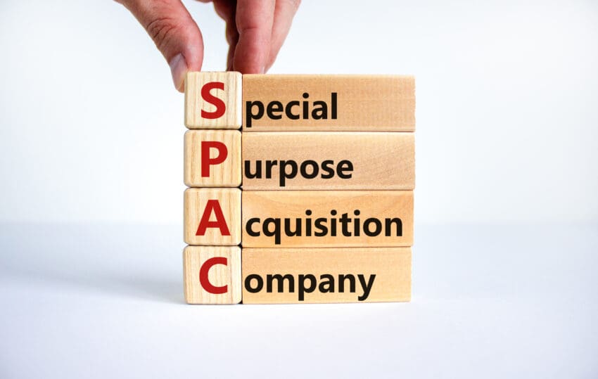 Spac,,Special,Purpose,Acquisition,Company,Symbol.,Businessman,Holds,Cubes,With