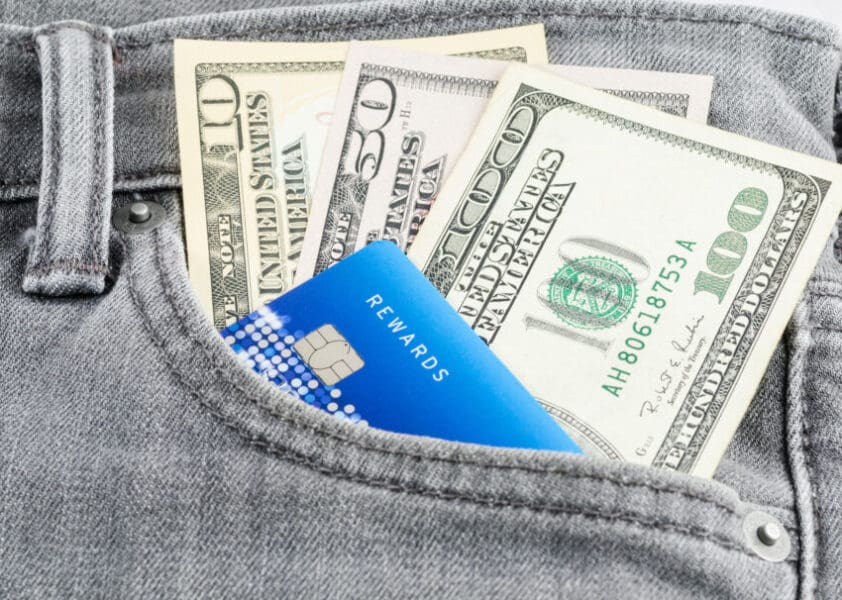 Us,Dollar,Banknote,And,Credit,Card,In,The,Grey,Jean