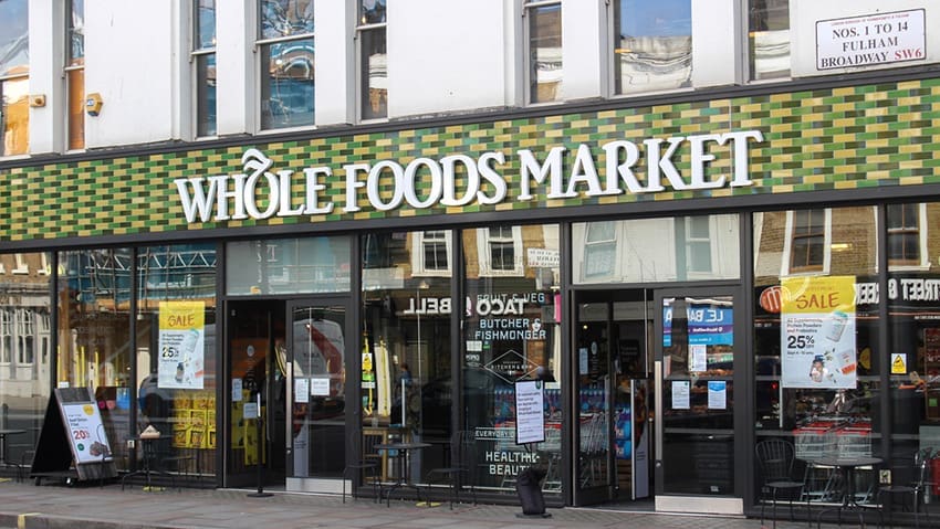 Amazon is dusting itself off for another tilt at Britain's fiercely competitive grocery sector, this time by converting its abandoned Fresh convenience stores into outlets for Whole Foods Market, the organic chain it acquired for $13.7 billion in 2017.