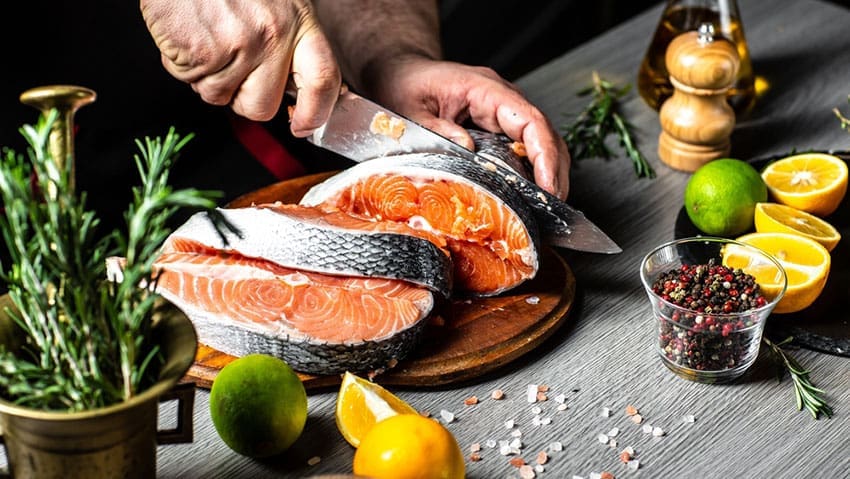 Exports of Scottish salmon to the United States have almost halved and the value of whisky shipments has fallen by a quarter, as President Trump's tariffs continue to bite into two of Britain's flagship food and drink trades.